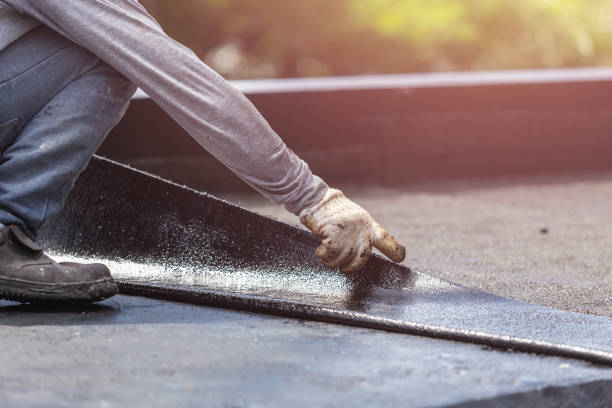 Professional Waterproofing technician working in Ringle, WI
